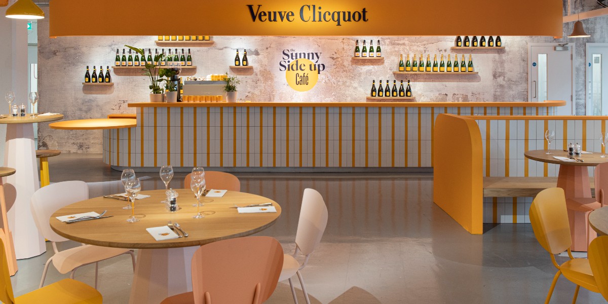 Cafe with circular tables and booths