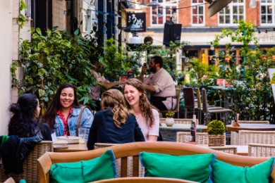 four women dining al fresco on Heddon Street