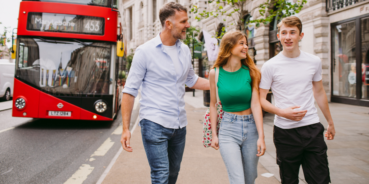 Family walking down the Regent Street Curve